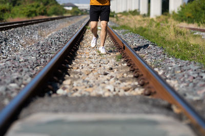 Low section of person on railroad track