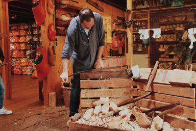 Man working at market stall