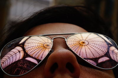 Close-up of young woman wearing sunglasses