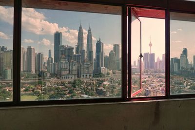 View kuala lumpur skyline from windows