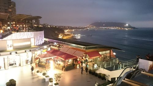 High angle view of illuminated city at night