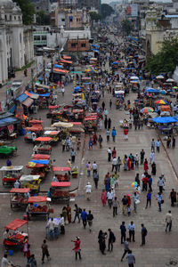 High angle view of people on street market