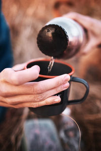 Close-up of man holding ice cream