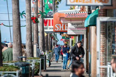 People walking on city street