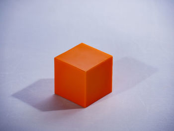 High angle view of orange design on white background