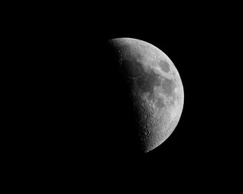 Low angle view of moon against sky at night