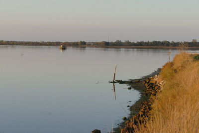 Scenic view of lake against clear sky