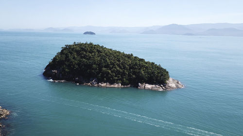 High angle view of bay in sea against sky