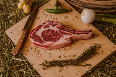 Close-up of meat on cutting board