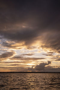 Beautiful amazon sunset clouds over the waters of negro river