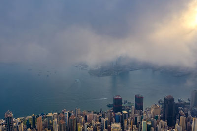 High angle view of buildings in city against sky