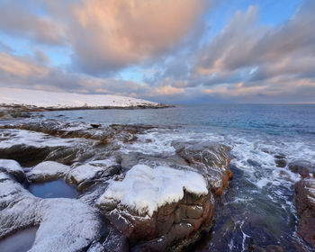 Scenic view of sea against sky during sunset