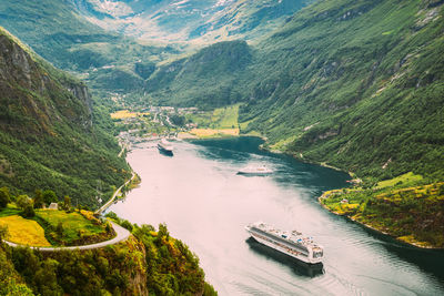 High angle view of river amidst mountains