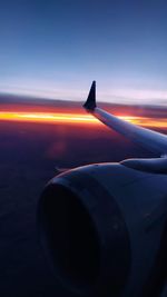 Cropped image of airplane wing