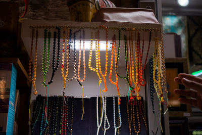 Close-up of necklace for sale in market