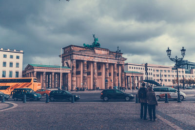 View of buildings against cloudy sky