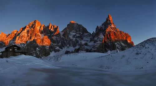 Italy, dolomities unesco heritage. scenic view of snowcapped  montains against clear sky. 