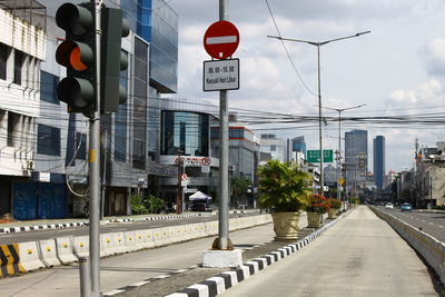 Road sign on street in city