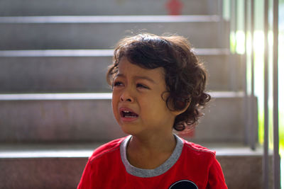 Portrait of boy looking away