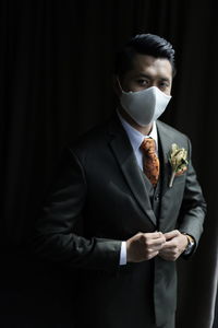 Groom with mask portrait