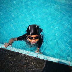 High angle view of kid in swimming pool