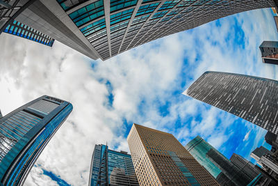 Low angle view of modern buildings against sky