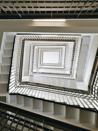 Directly below shot of spiral staircase in building