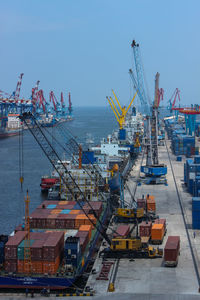 Container ship at commercial and business harbor