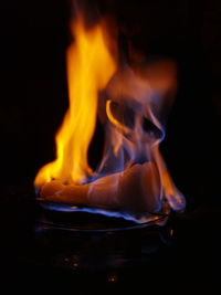 Close-up of fire in the dark