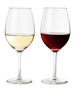 Close-up of wineglass against white background