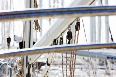 Low angle view of ropes at sailboat