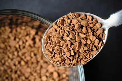 Close-up of coffee beans on table