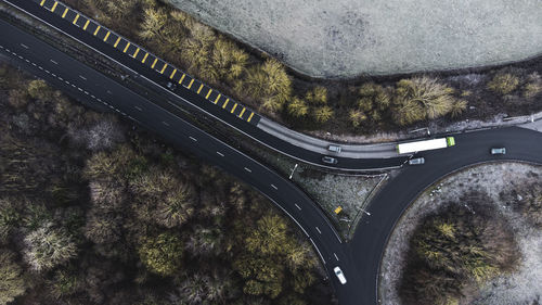 Winter road view from above trees