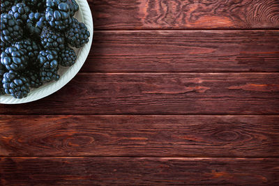 High angle view of bread on wooden table