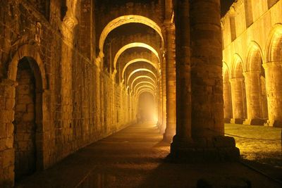Corridor of fountains abbey at night
