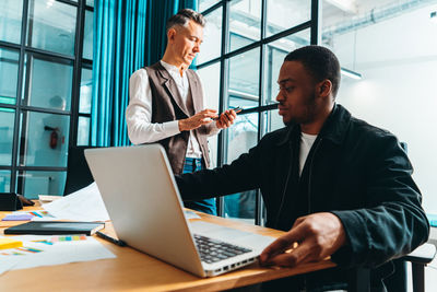 Business colleagues working at office