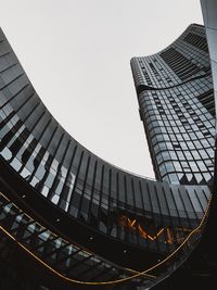 Low angle view of modern building against clear sky