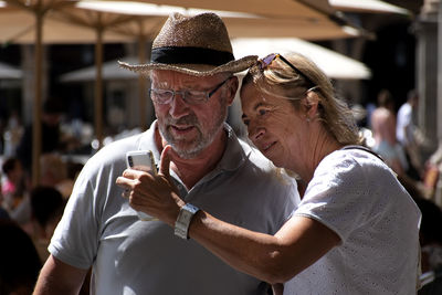 Midsection of man wearing hat outdoors