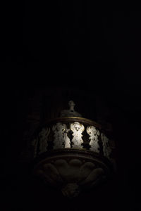 Low angle view of statue at night