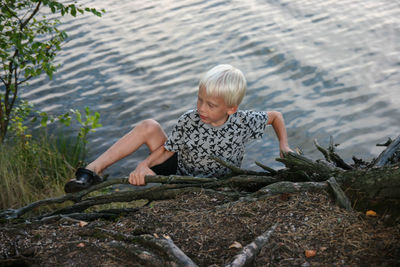 Woman sitting in water