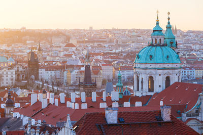 Sunrise view st nicholas church and the old town of prague.