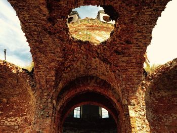 Low angle view of old ruins against clear sky