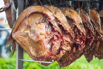 Various dry smoked spiced fish ready to eat in a fish market