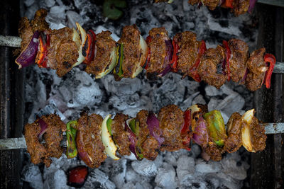 Close-up of meat on barbecue grill