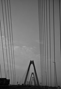 Low angle view of bridge against sky during sunset