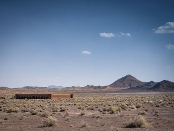 Scenic view of desert against sky