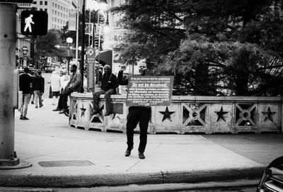 People on street in city