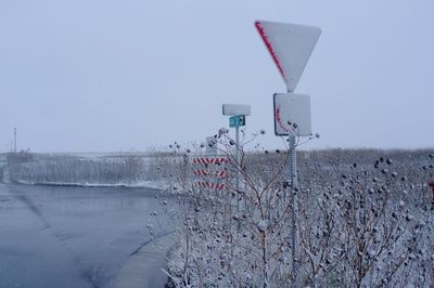 Built structure on snow against clear sky