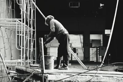 Man working at construction site in building