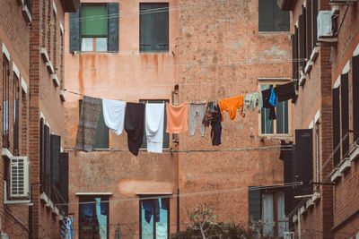 Clothes drying outside house